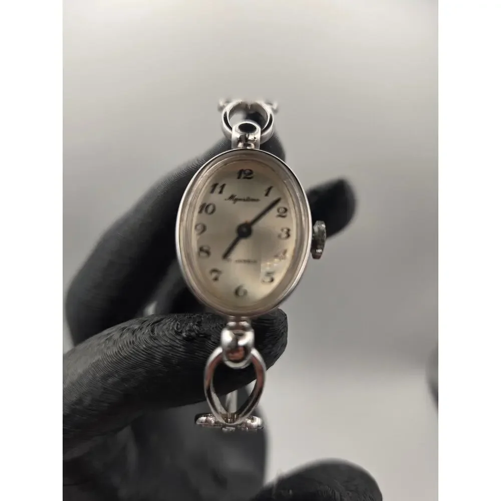 Vintage Majestime 17-jewel mechanical bangle watch.